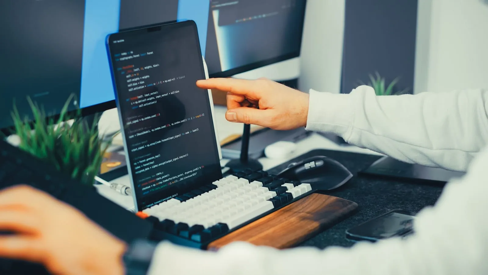 A team working with software and AI tools